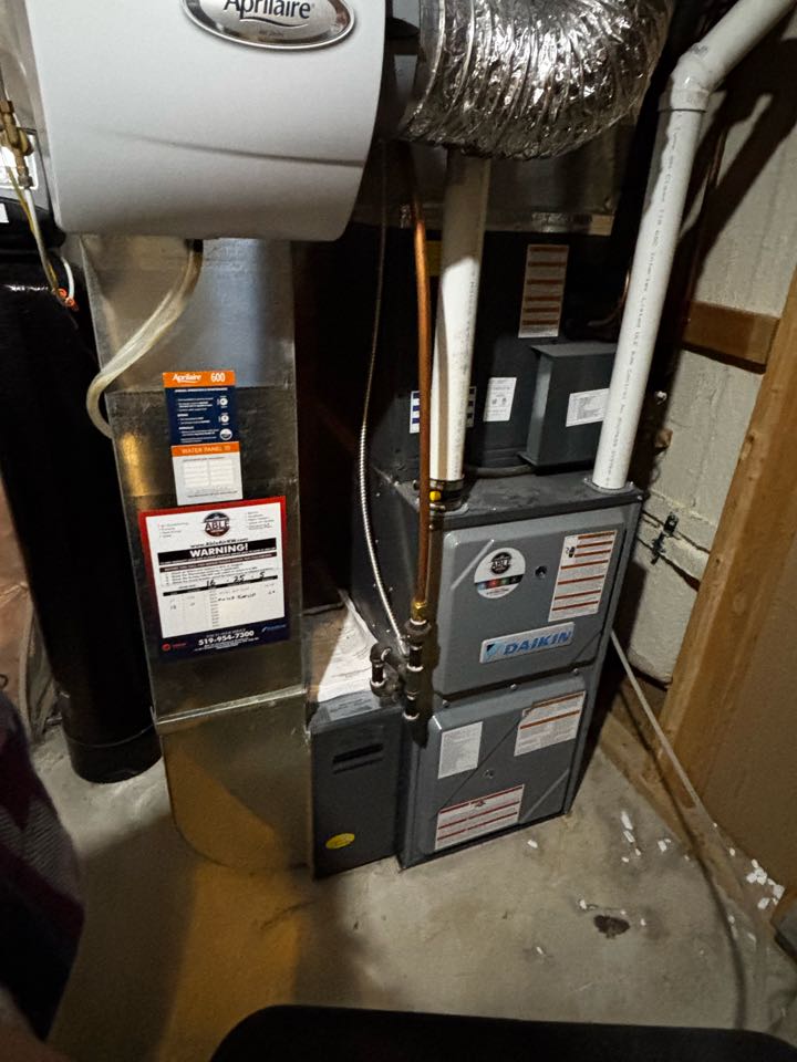 Completing a Daikin furnace tune up for a family in the Hanlon Creek area of Guelph