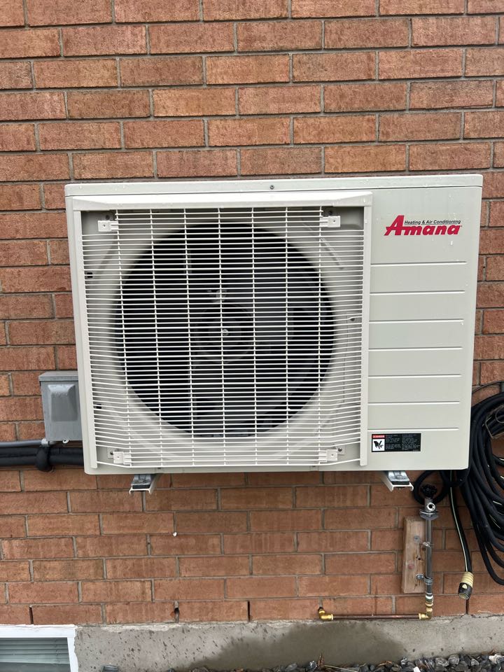Servicing heat pump for a family in Kitchener 