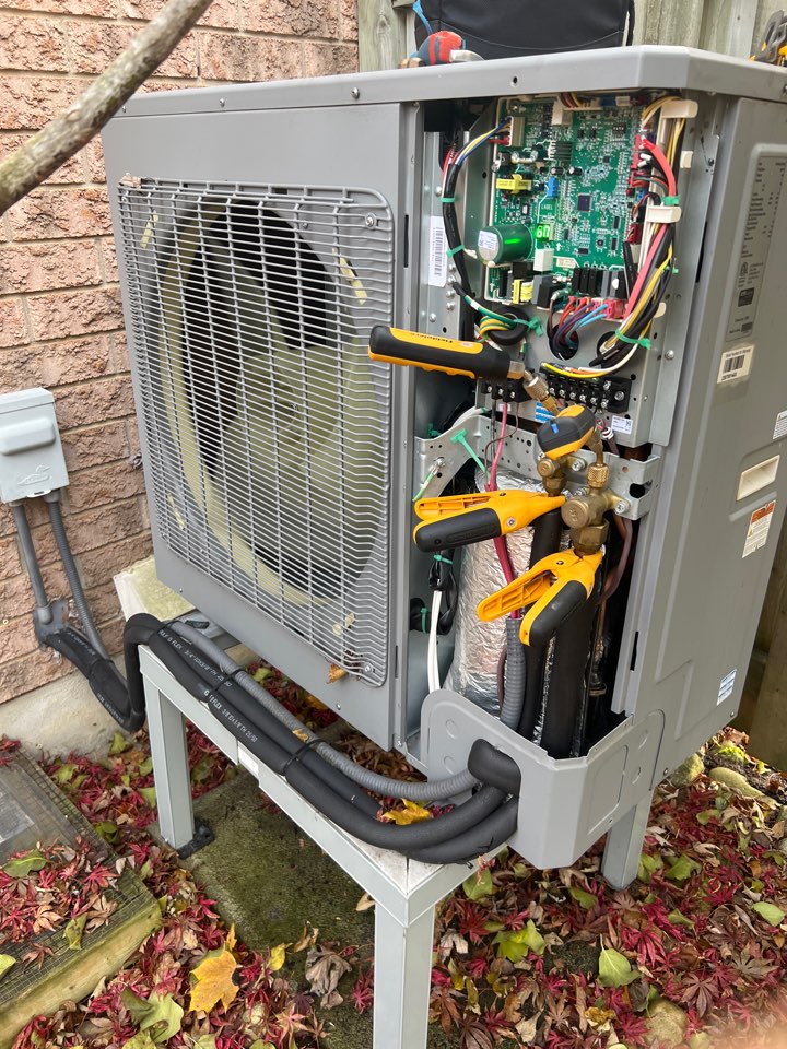 Servicing a heat pump for a family in Waterloo