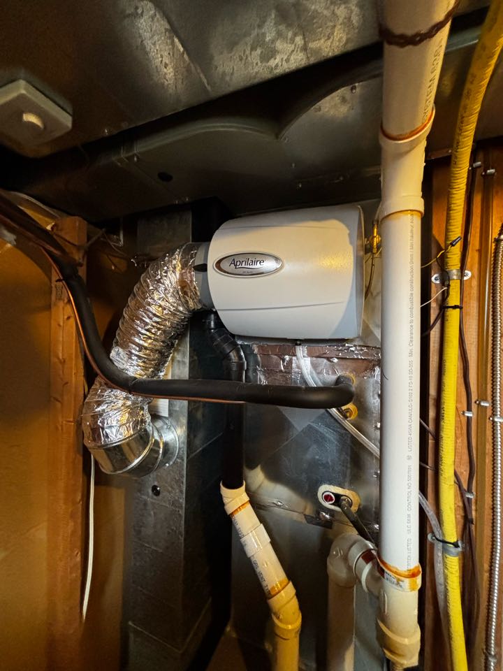 Completing an Aprilaire Humidifier service call for a family in the Sunnydale area of Waterloo