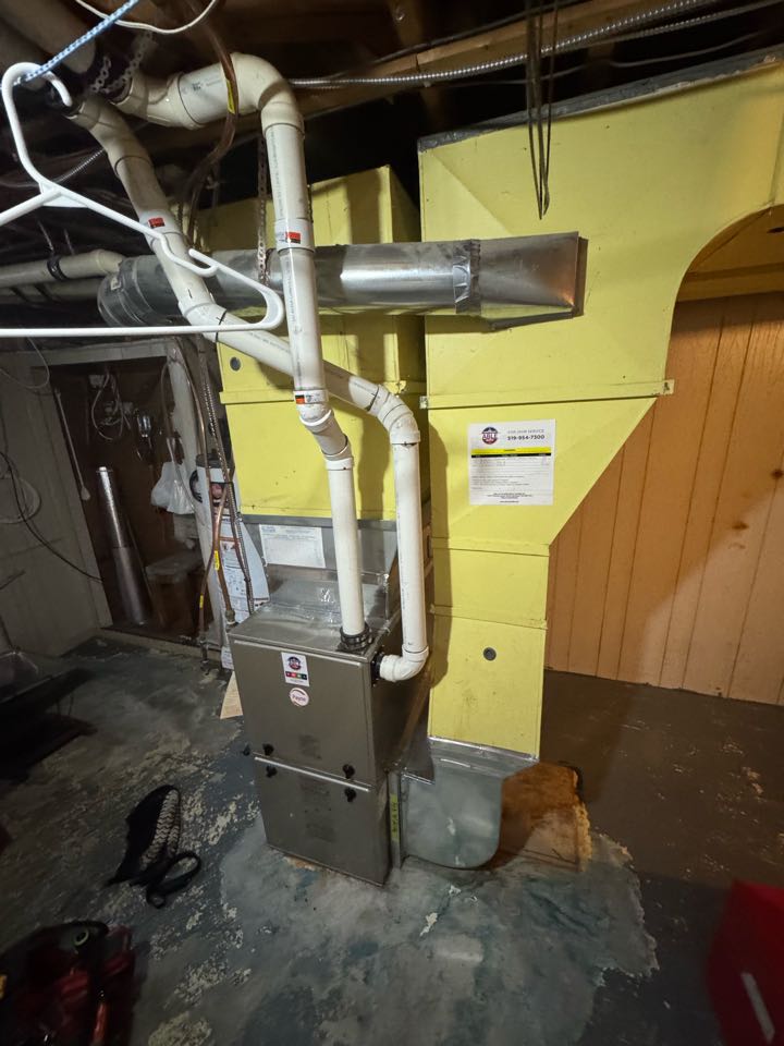 Servicing a Payne furnace for a family in the Stanley Park area of Kitchener 