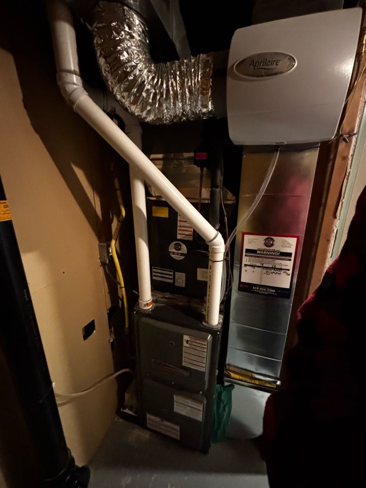 Completing a furnace tune up for a family in the Parkwood Gardens area of Guelph