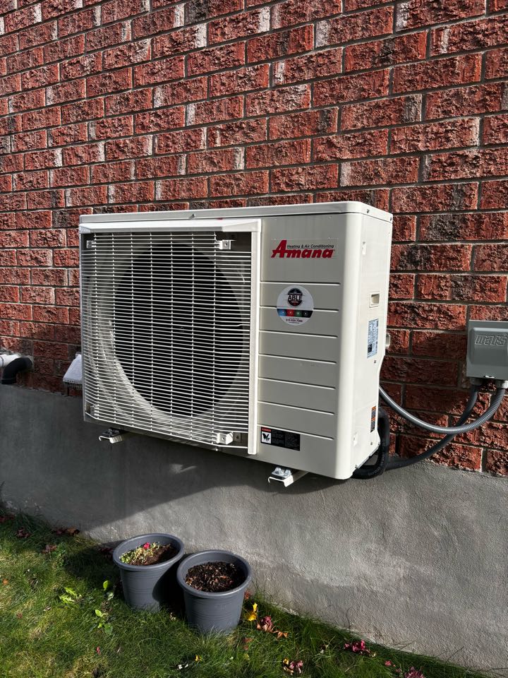 Completing an Amana Heat pump service for a family in the East Hespeler area of Cambridge