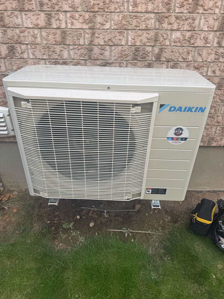 Servicing heat pump for a family in Kitchener 