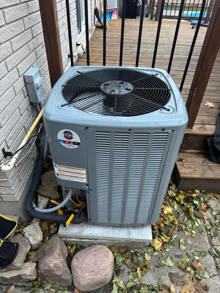 Servicing an AC for a family in Kitchener 