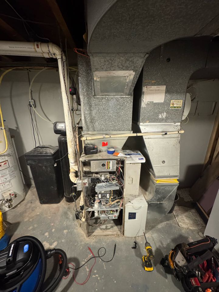 Servicing a furnace for a family in Kitchener 
