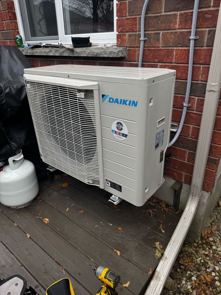 Servicing a heat pump for a family in Waterloo