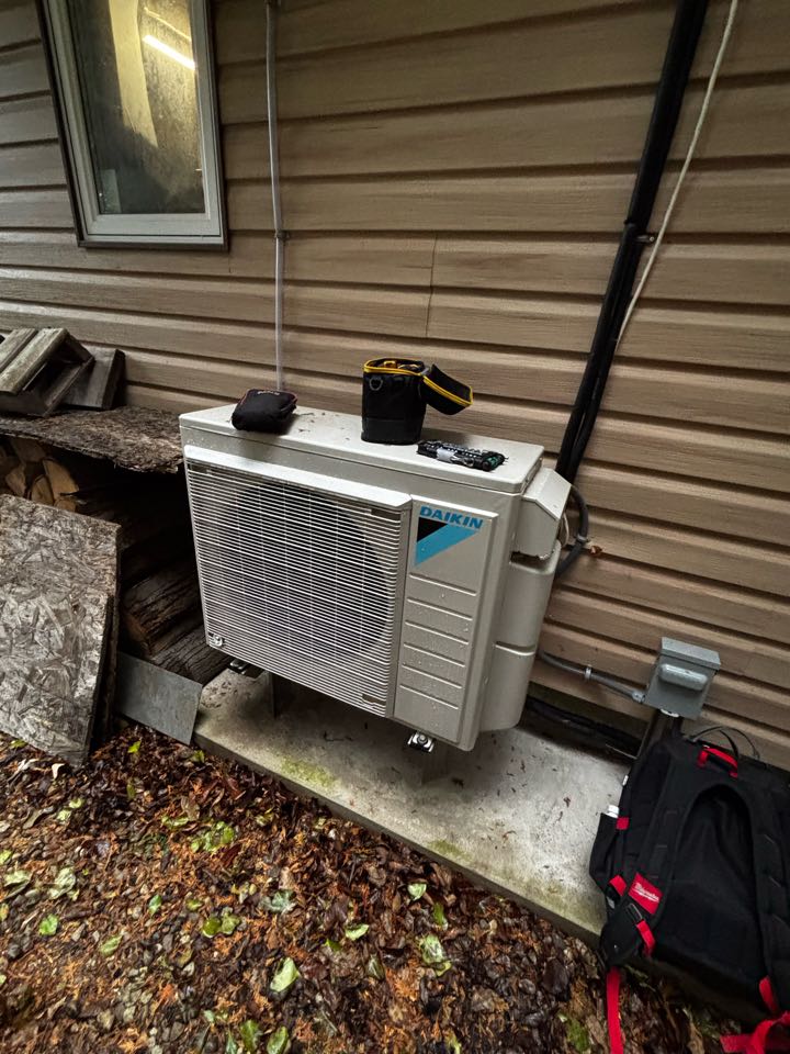 Completing a Daikin Heat pump tune up for a family in the Hespeler area of Cambridge