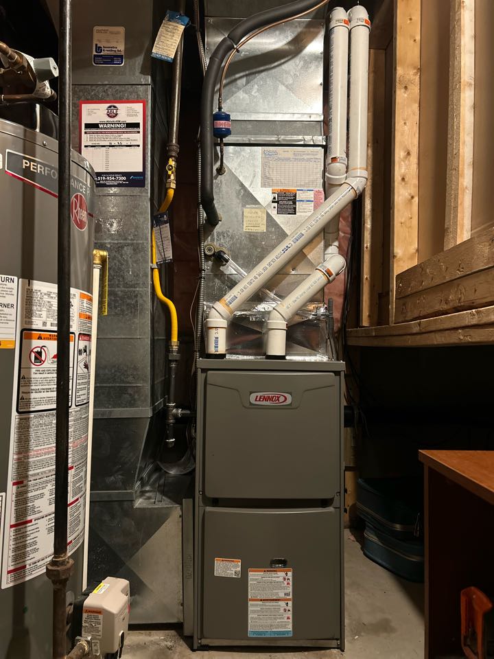 Completing a Lennox furnace install for a family in the Forest Heights area of Kitchener