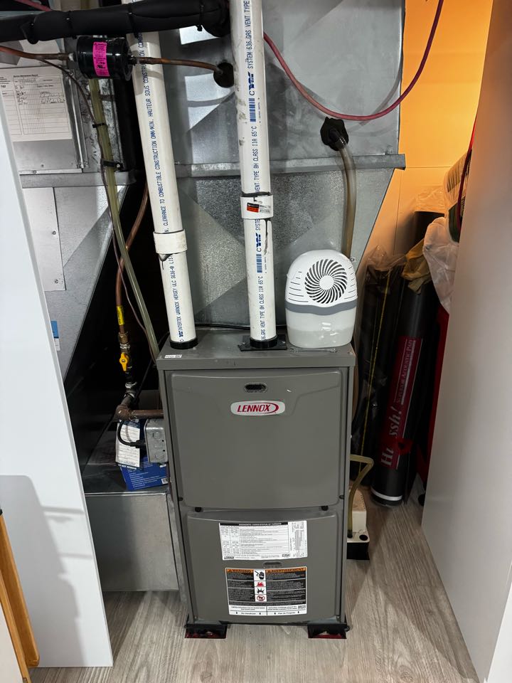 Servicing a Lennox furnace for a family in the Rockway area of Kitchener 