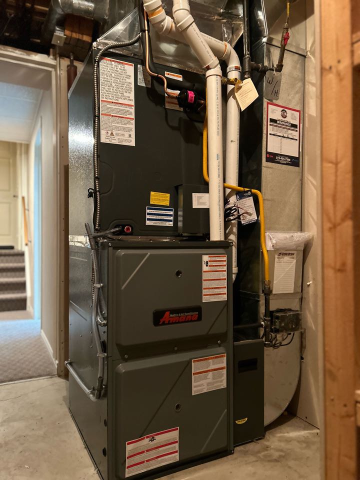 Installing an Amana furnace for a family in the Country Hills West area of Kitchener