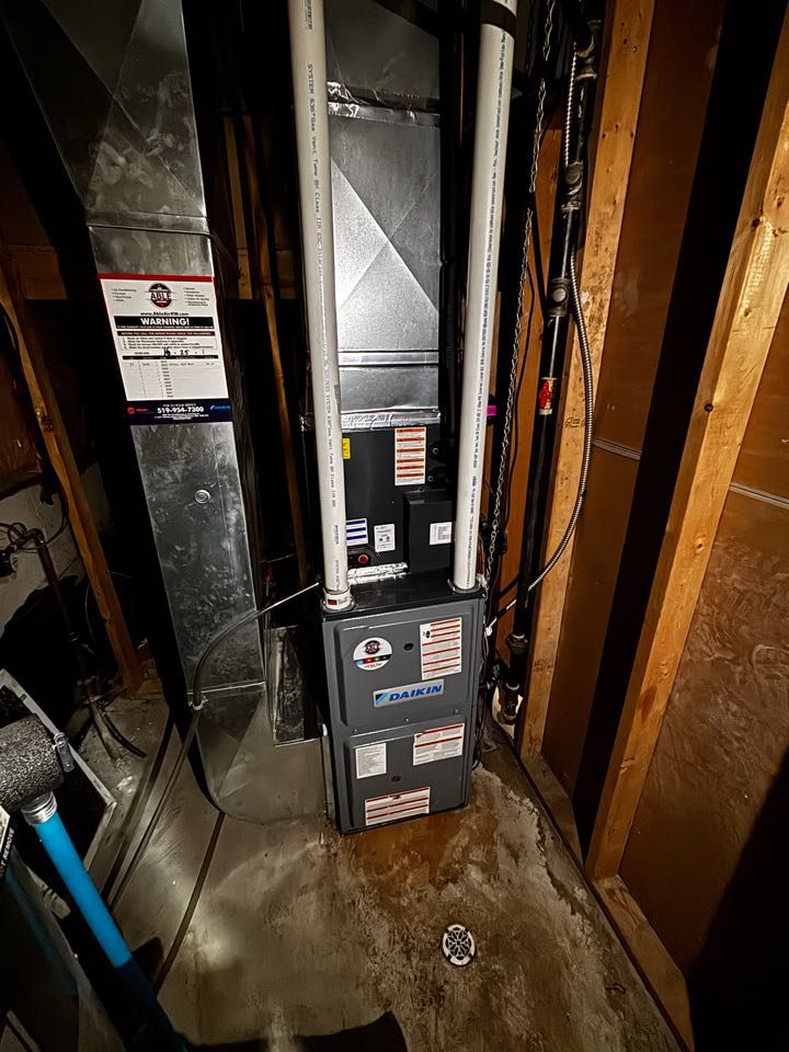 Servicing a Daikin furnace for a family in the Forest Hill area of Kitchener