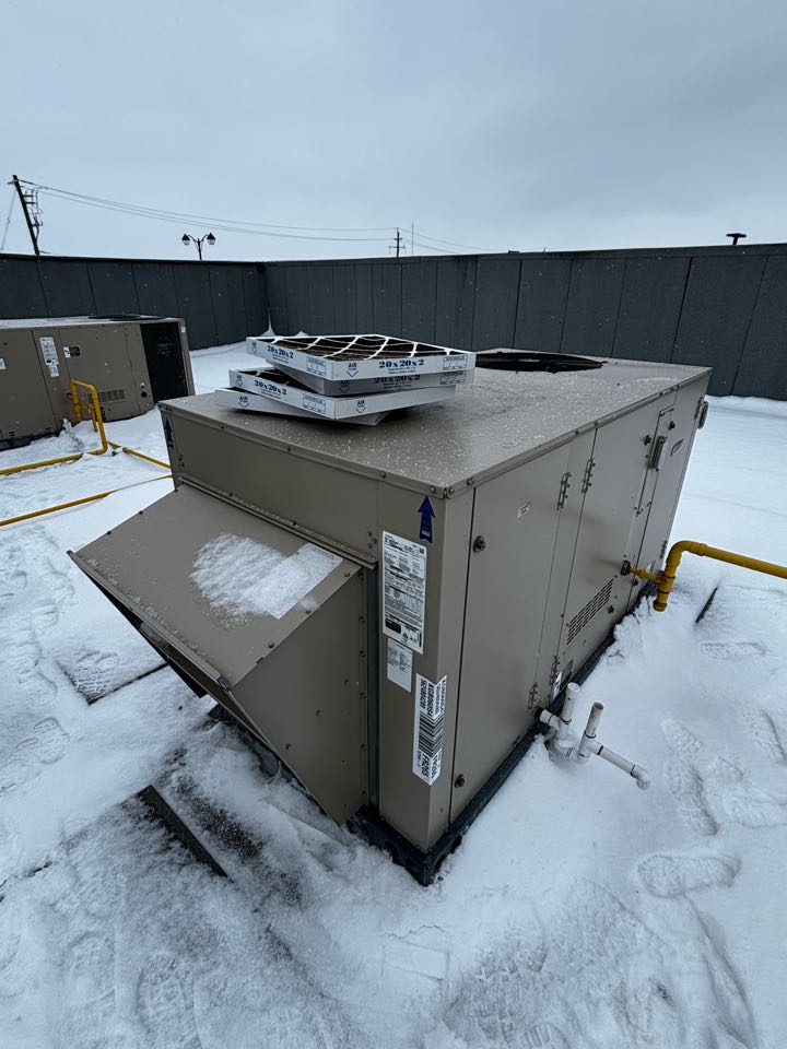 Completing a Rooftop unit maintenance for a business in the Maple Hills area of Waterloo