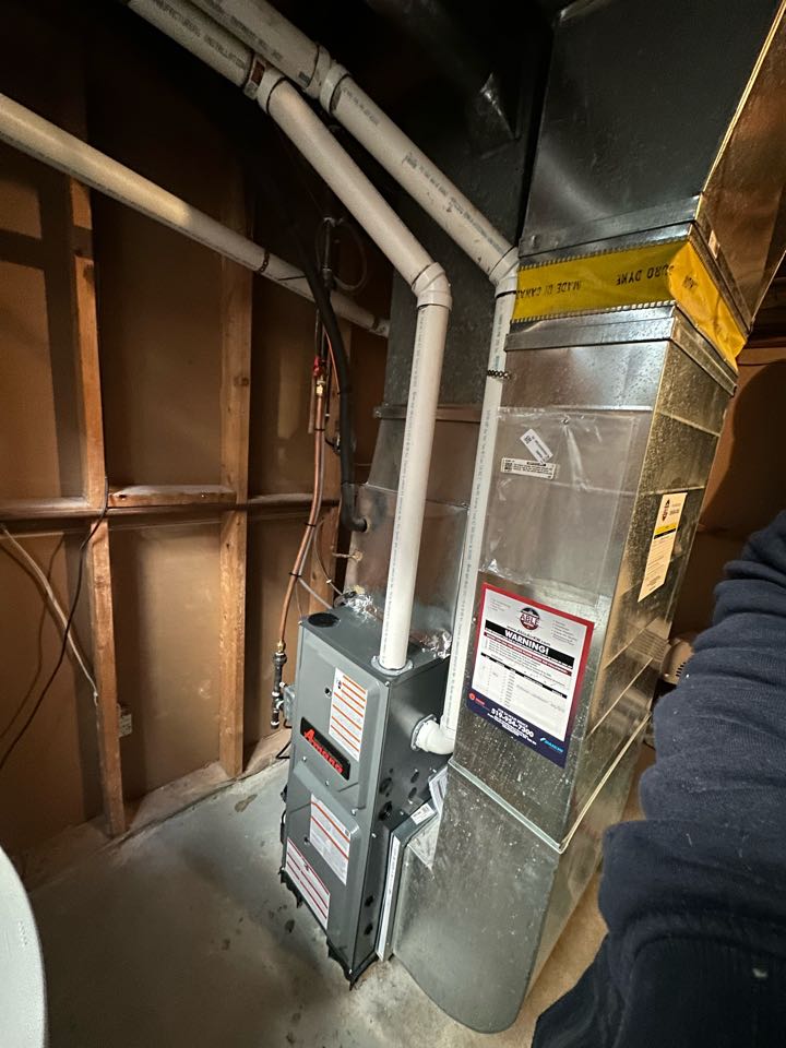 Completing an Amana furnace installation for a family in the Trillium Industrial Park area of Kitchener 