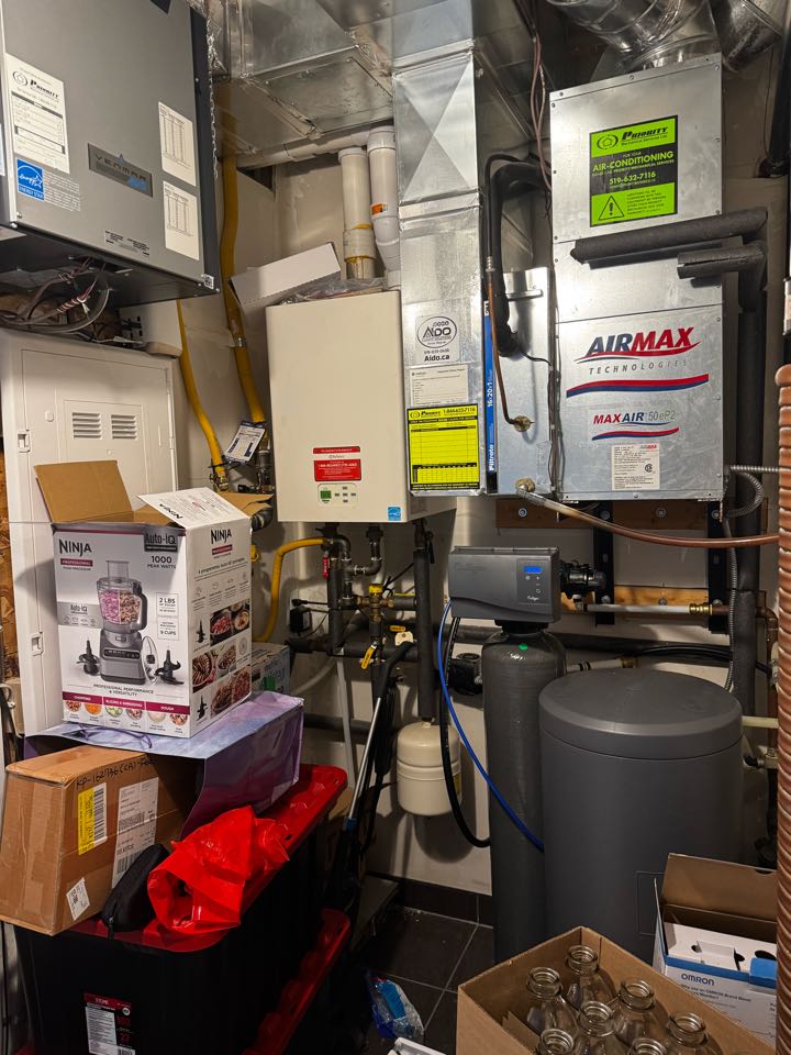 Working on a hydronic heater for a family in Guelph 