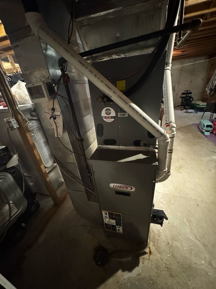 Servicing a Lennox furnace for a family in the Clairfields area of Guelph 