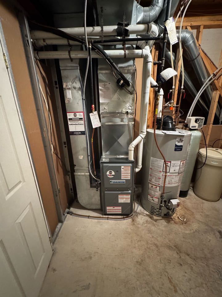 Completing a Daikin furnace service for a family in the the Highland West area of Kitchener