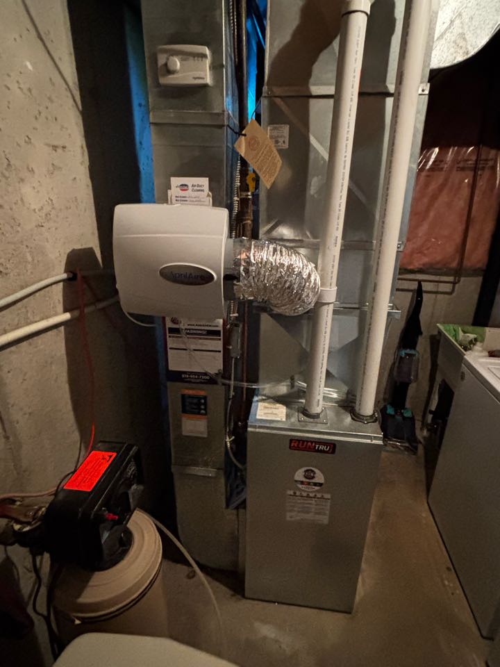 Completing an Aprilaire Humidifier install for a family in the Country Hills West area of Kitchener 