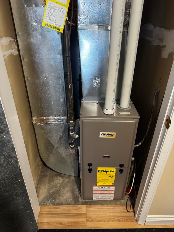 Completing a Luxaire furnace service for a family in the Bridgeport area of Kitchener 