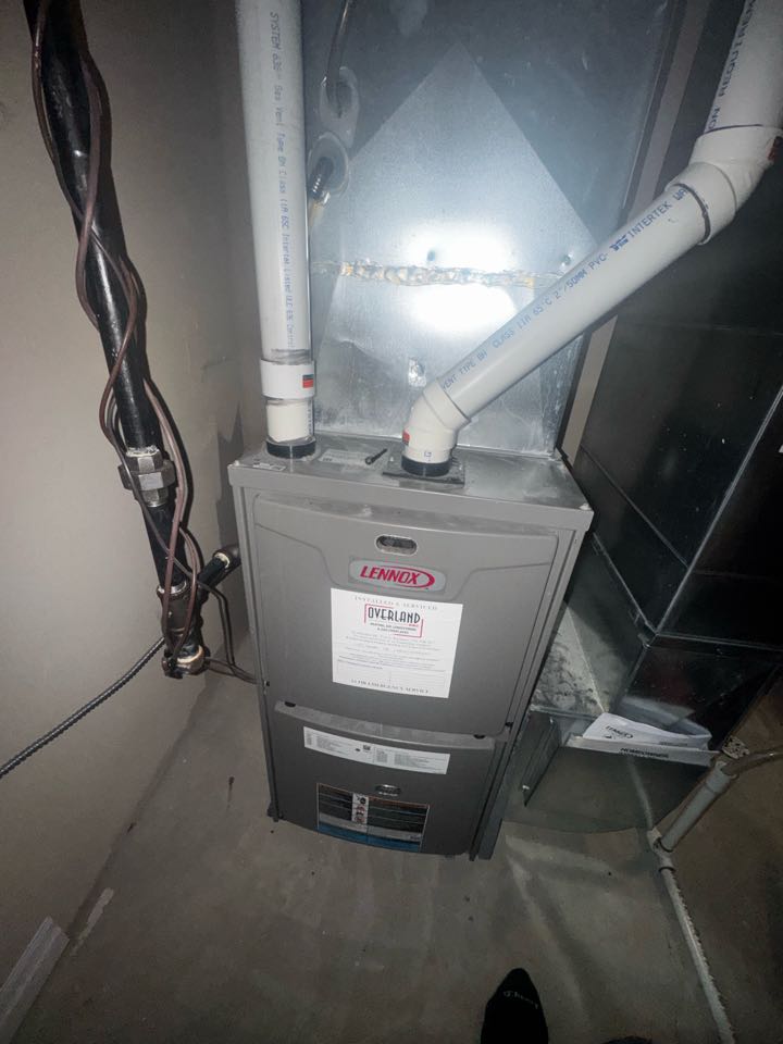 Servicing a Lennox furnace for a family in the West Galt area of Cambridge