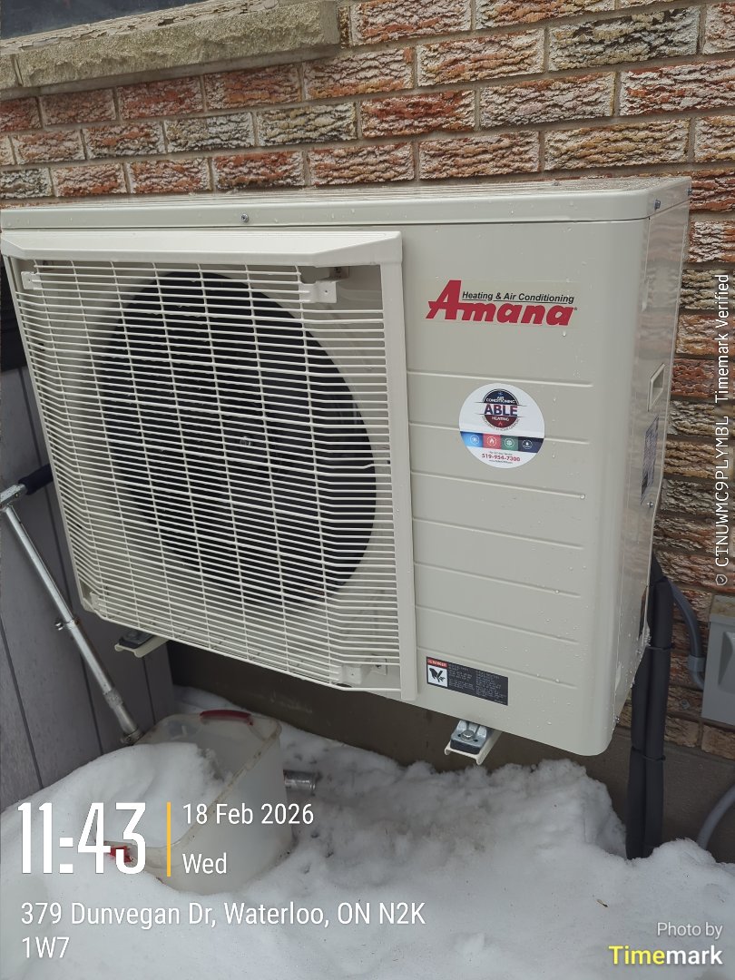 Completing an Amana furnace and heat pump tune-up in the Conestoga mall area of Waterloo 