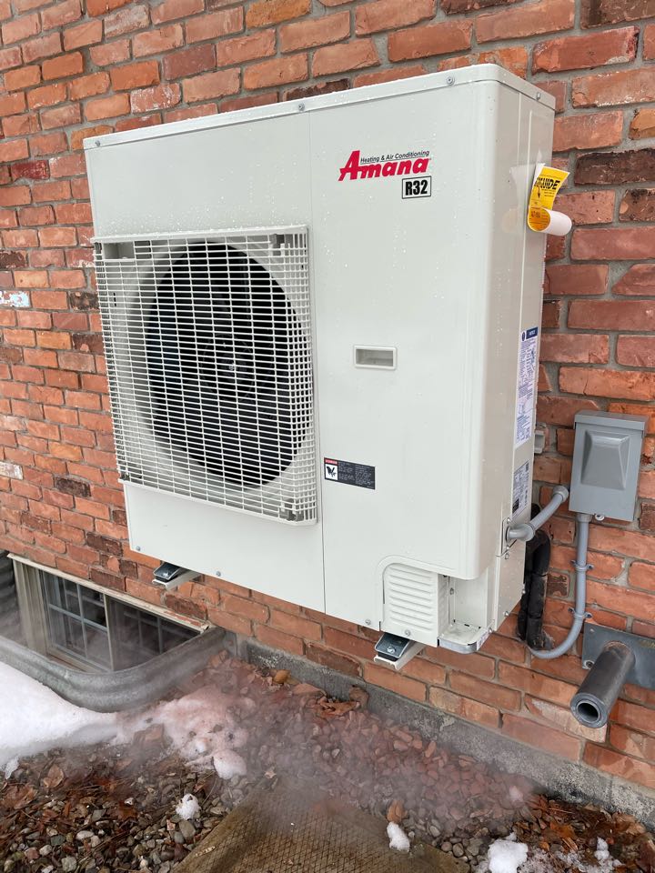 Completing an Amana heat pump install for a family in the Idlewood area of Kitchener