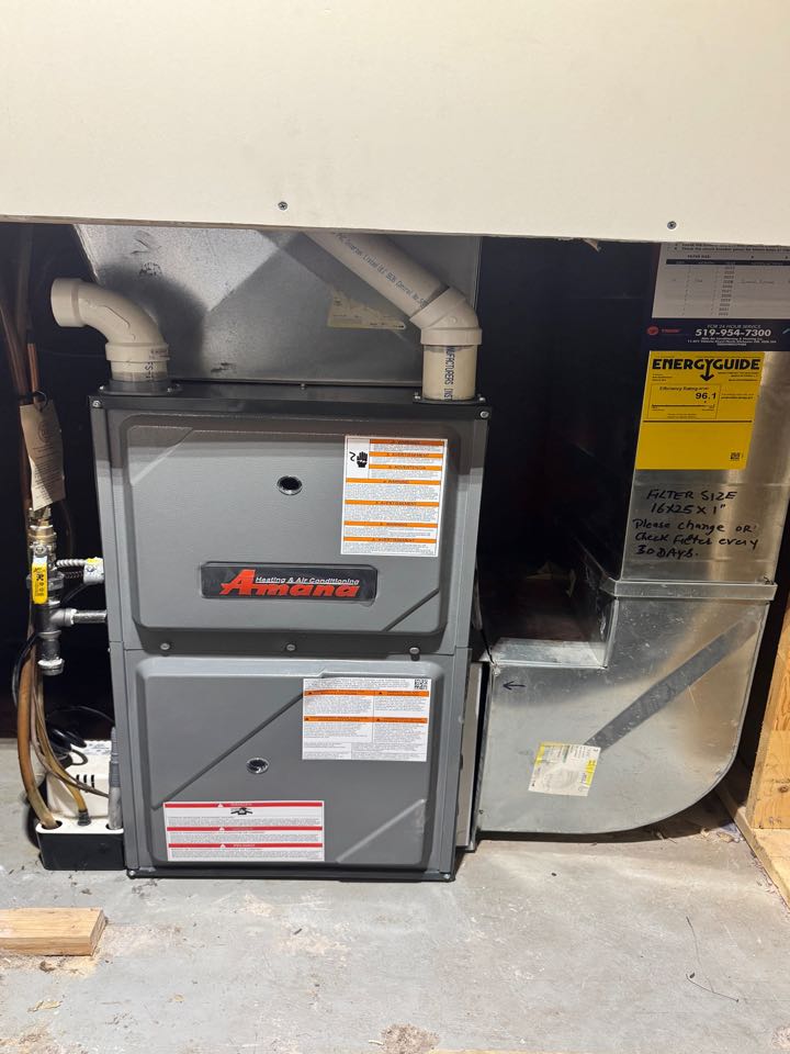 Completing an Amana furnace installed for a family in the Greenway-Chaplin area of Cambridge 