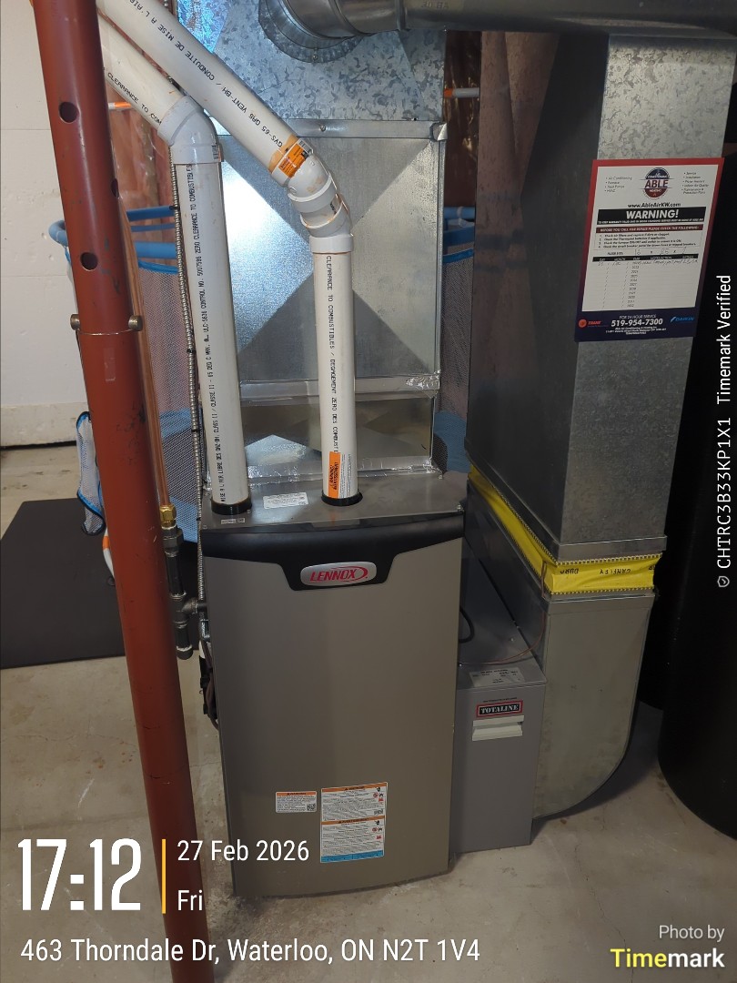 Completing a service call for a customer in the Maple Hills area of Waterloo