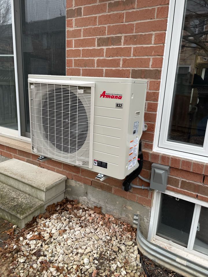 Completing an Amana Heat Pump install for a family in the Willmott area of Milton
