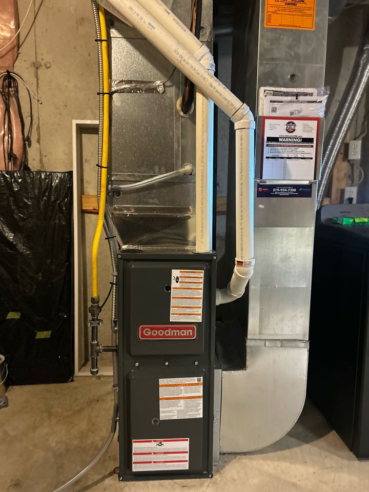 Completing a Goodman furnace install for a family in the Huron South area of Kitchener