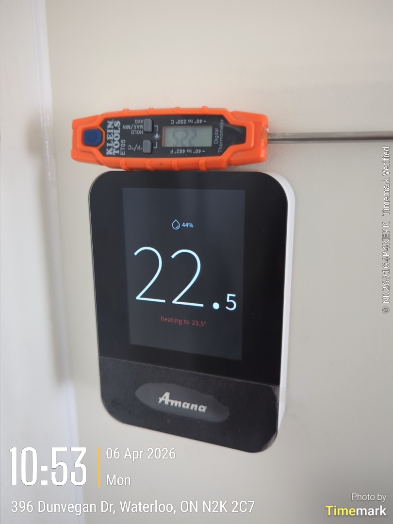 Completing a thermostat calibration off on Amana heat pump system for a family in the Sandowne Park area of Waterloo