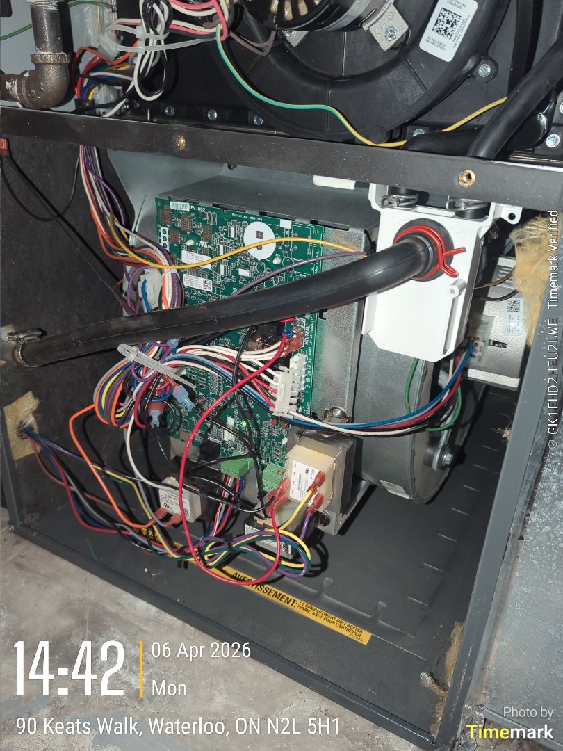 Completing a furnace board replacement for a family in the Beechwood area of Waterloo