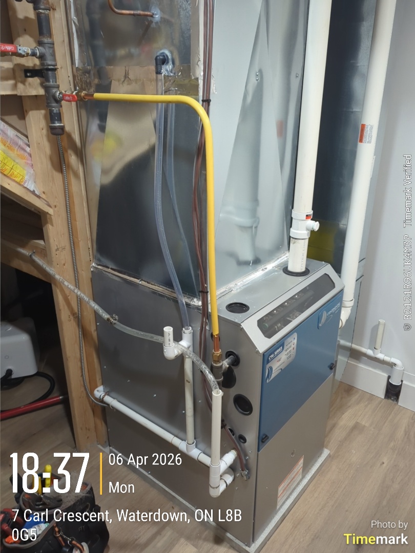 Completing a furnace service call for a family in Waterdown