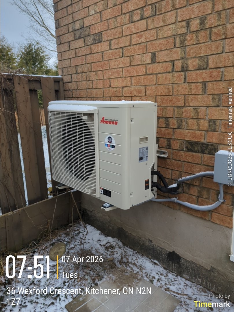 Completing an Amana heat pump service for a customer in the Victoria Hills area of Kitchener 