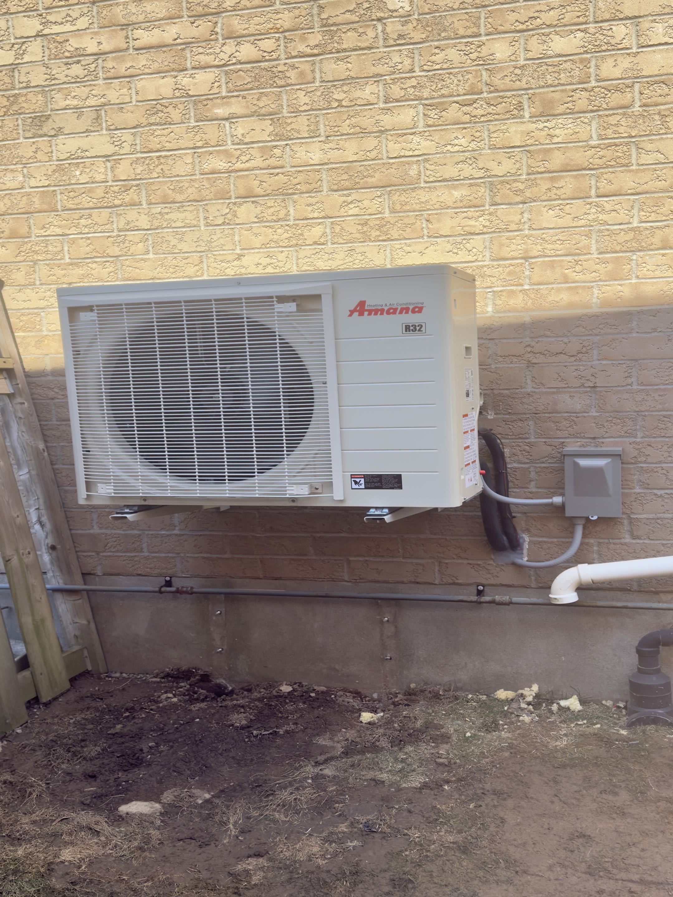 Completing an Amana Heat Pump and furnace Installation for a family in the Williamsburg area of Kitchener