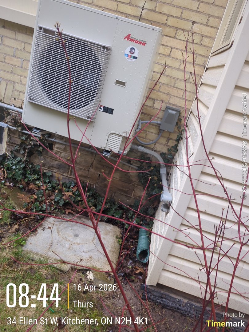 Completing an Amana heat pump and furnace tune-up for a family in the Central Frederick area of Kitchener