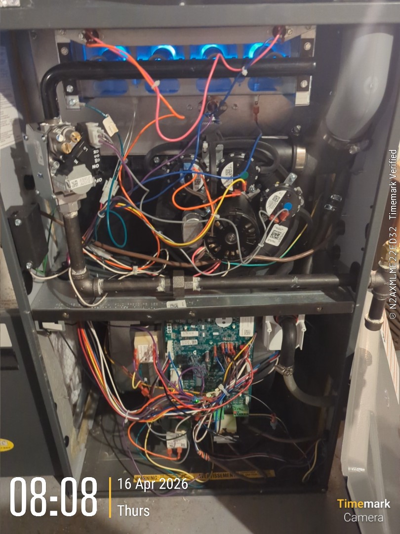 Completing an Amana heat pump and furnace tune-up for a family in the Central Frederick area of Kitchener