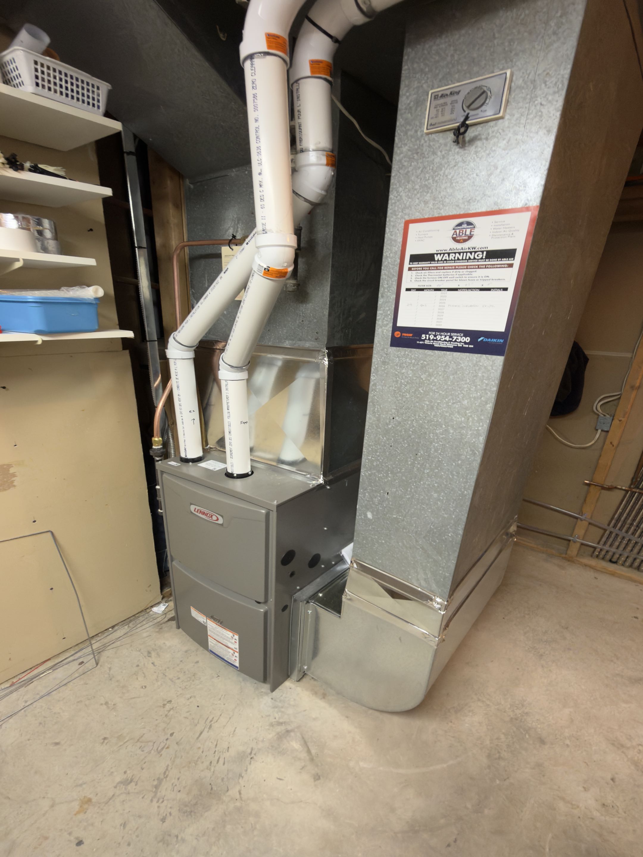 Completing a Lennox Furnace installation for a family in the Highland West area of Kitchener