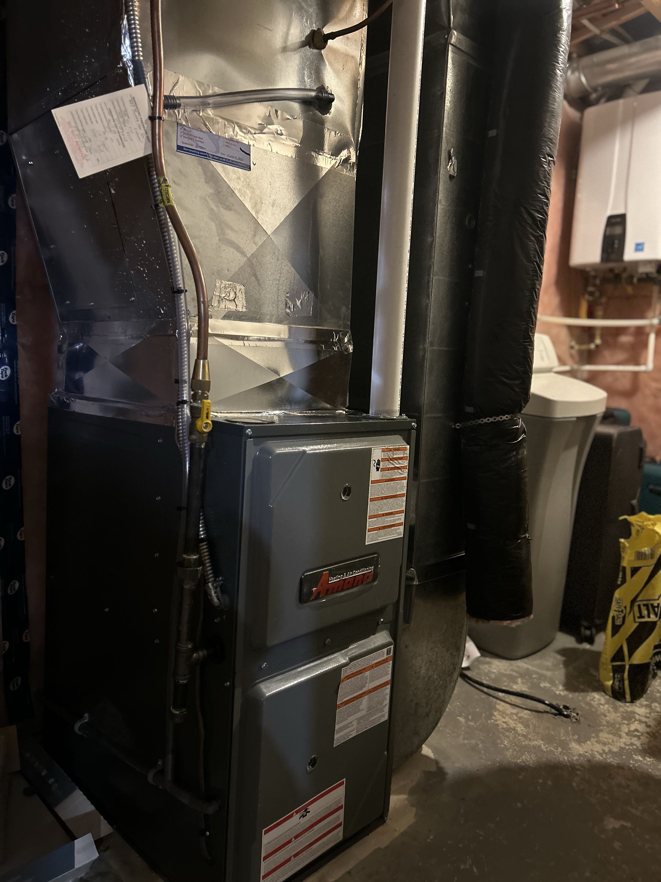 Completing an Amana furnace install for a family in the Doon South area of Kitchener