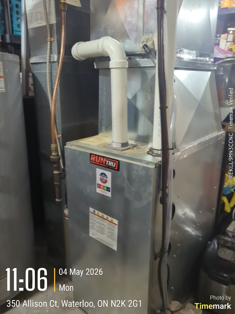Completing a furnace and AC tune-up for a family in the University area of Waterloo