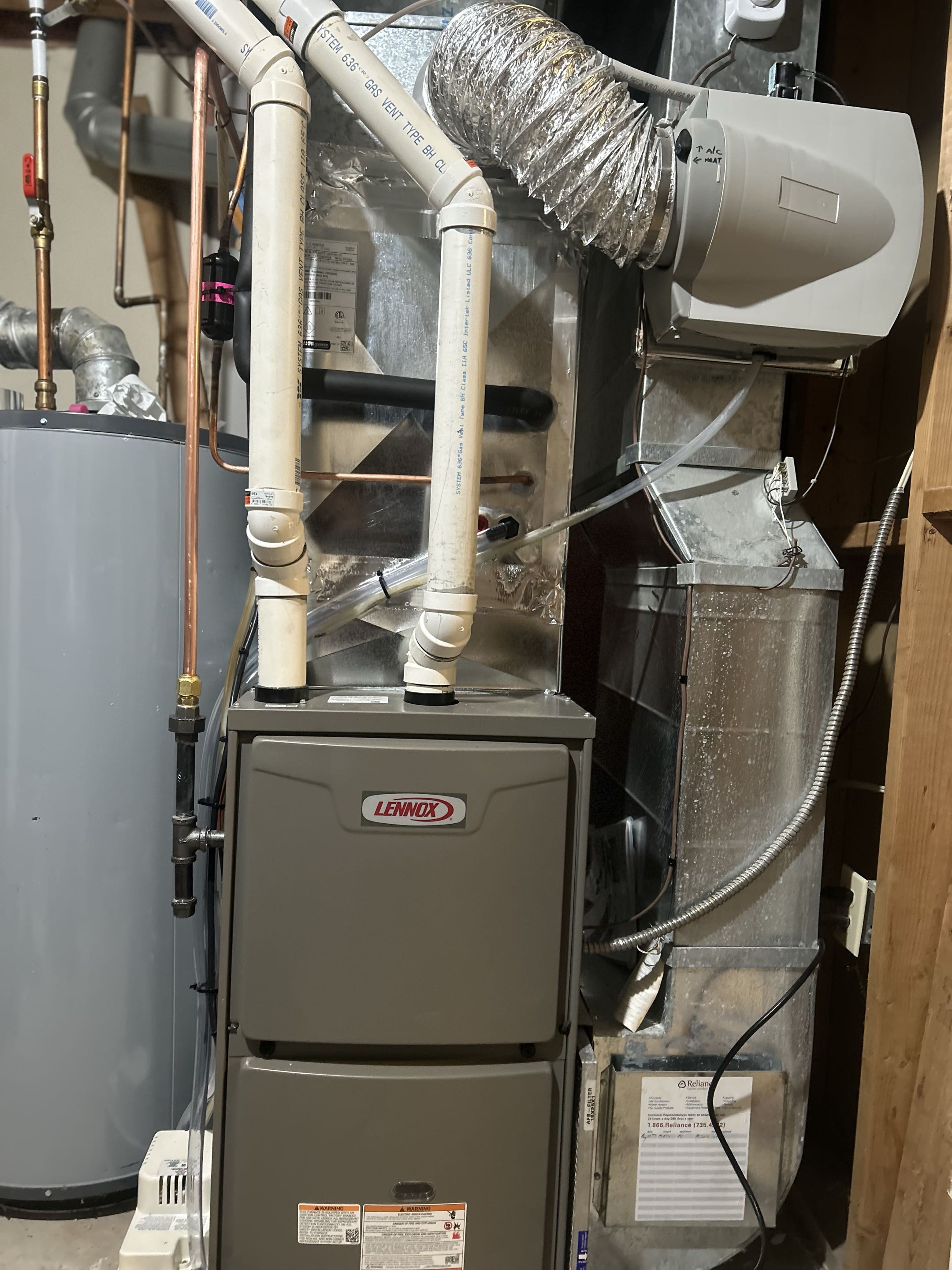 Completing a Lennox Furnace install for a family in the the Galt area of Cambridge