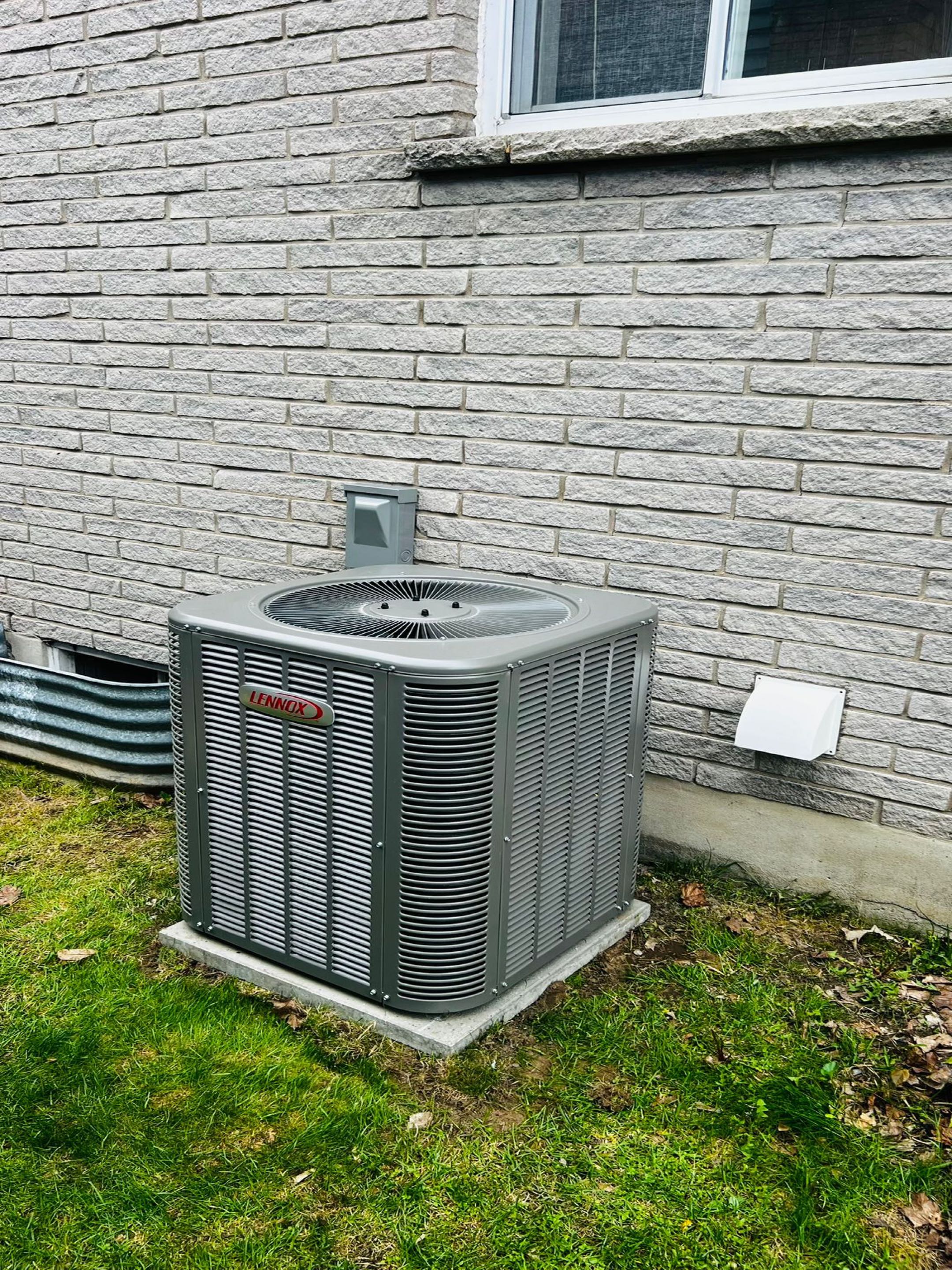 Completing a Lennox AC install for a family in the the Galt area of Cambridge
