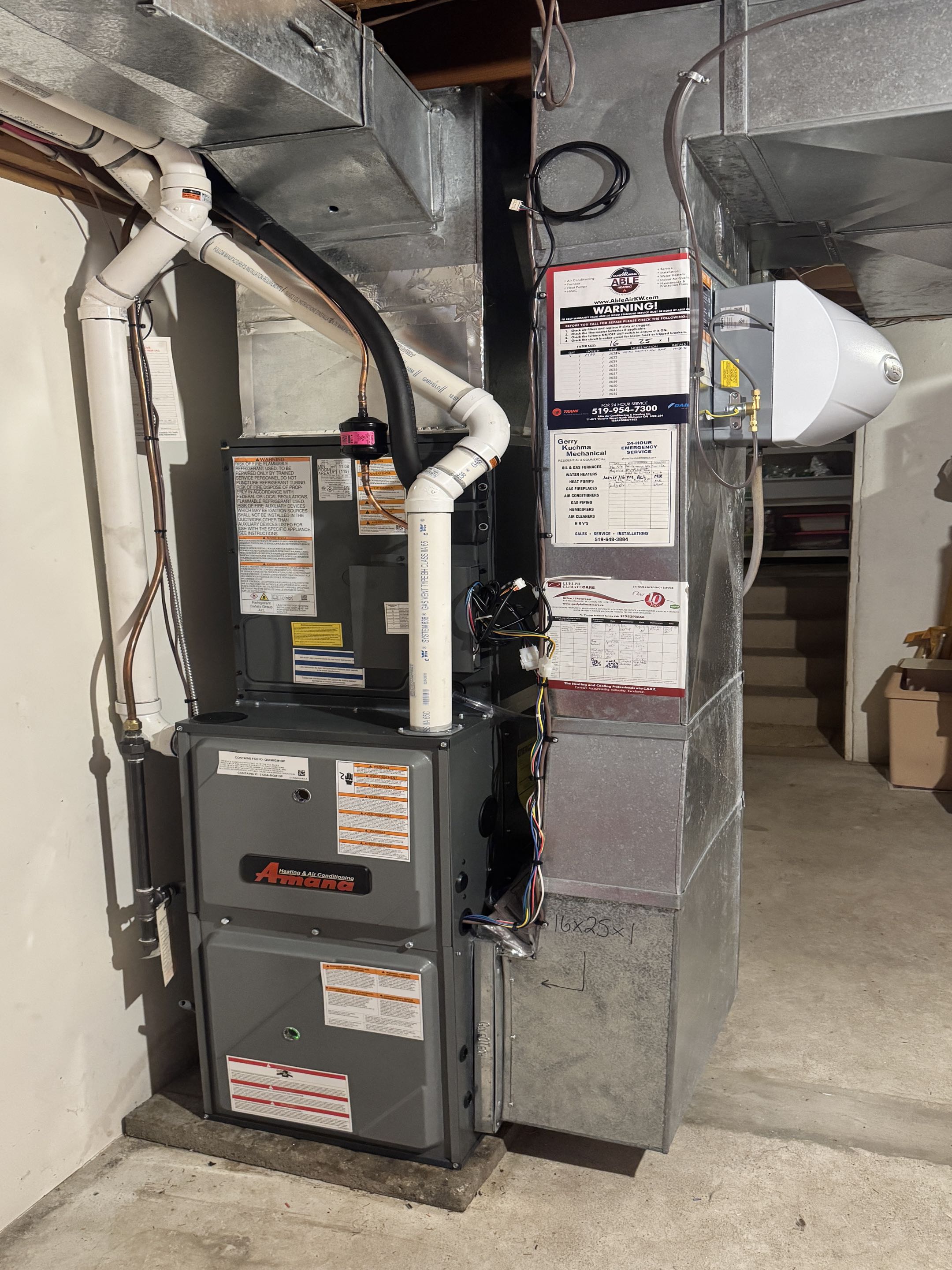 Completing an Amana furnace install for a family in the Onward Willow area of Guelph