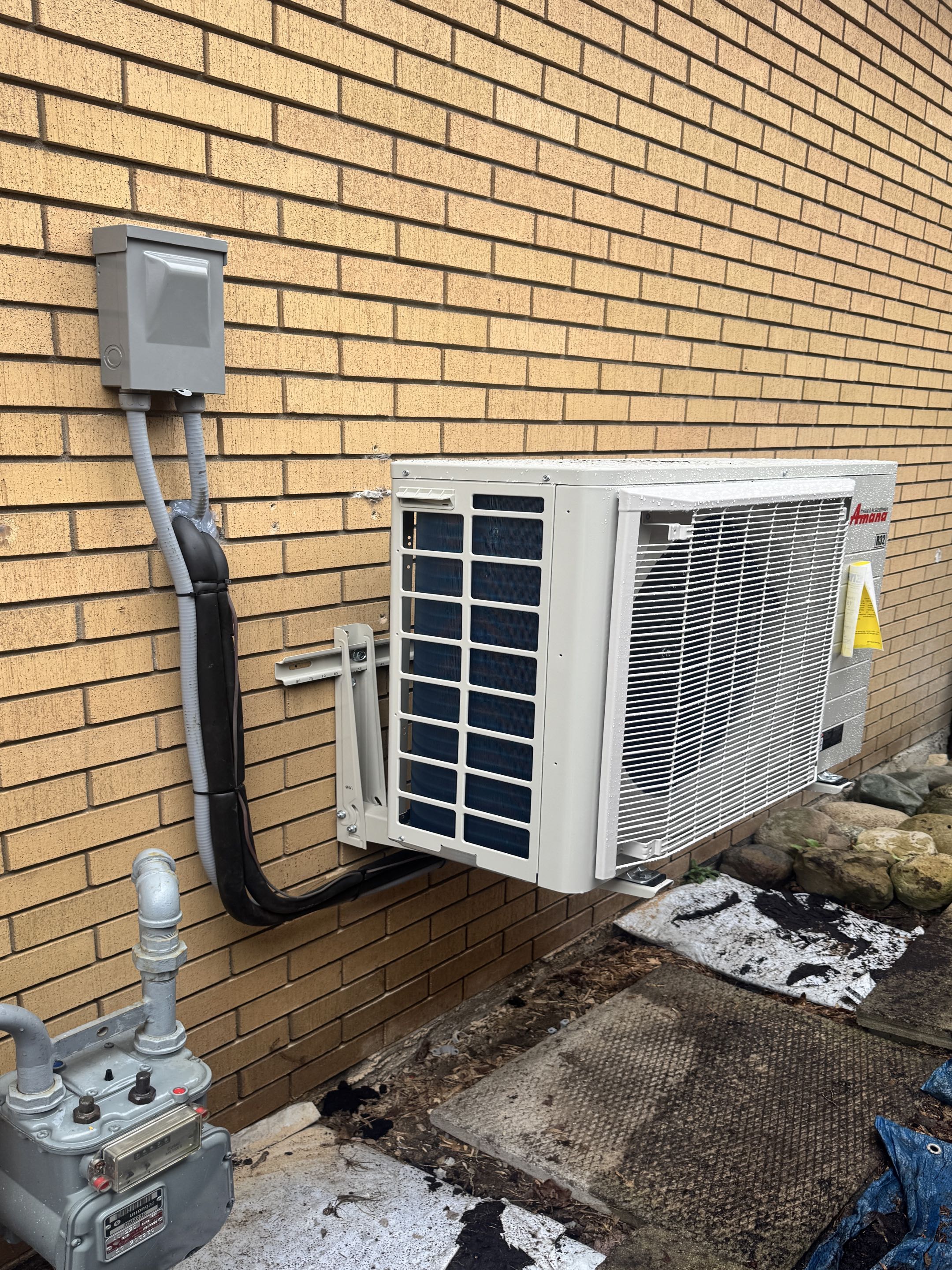 Completing an Amana Heat pump install for a family in the Onward Willow area of Guelph