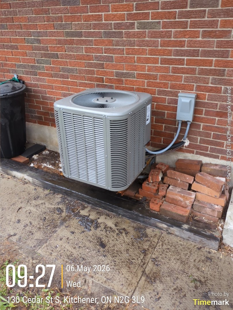 Completing an AC tune-up for a customer in the Kaufman Park area of Kitchener