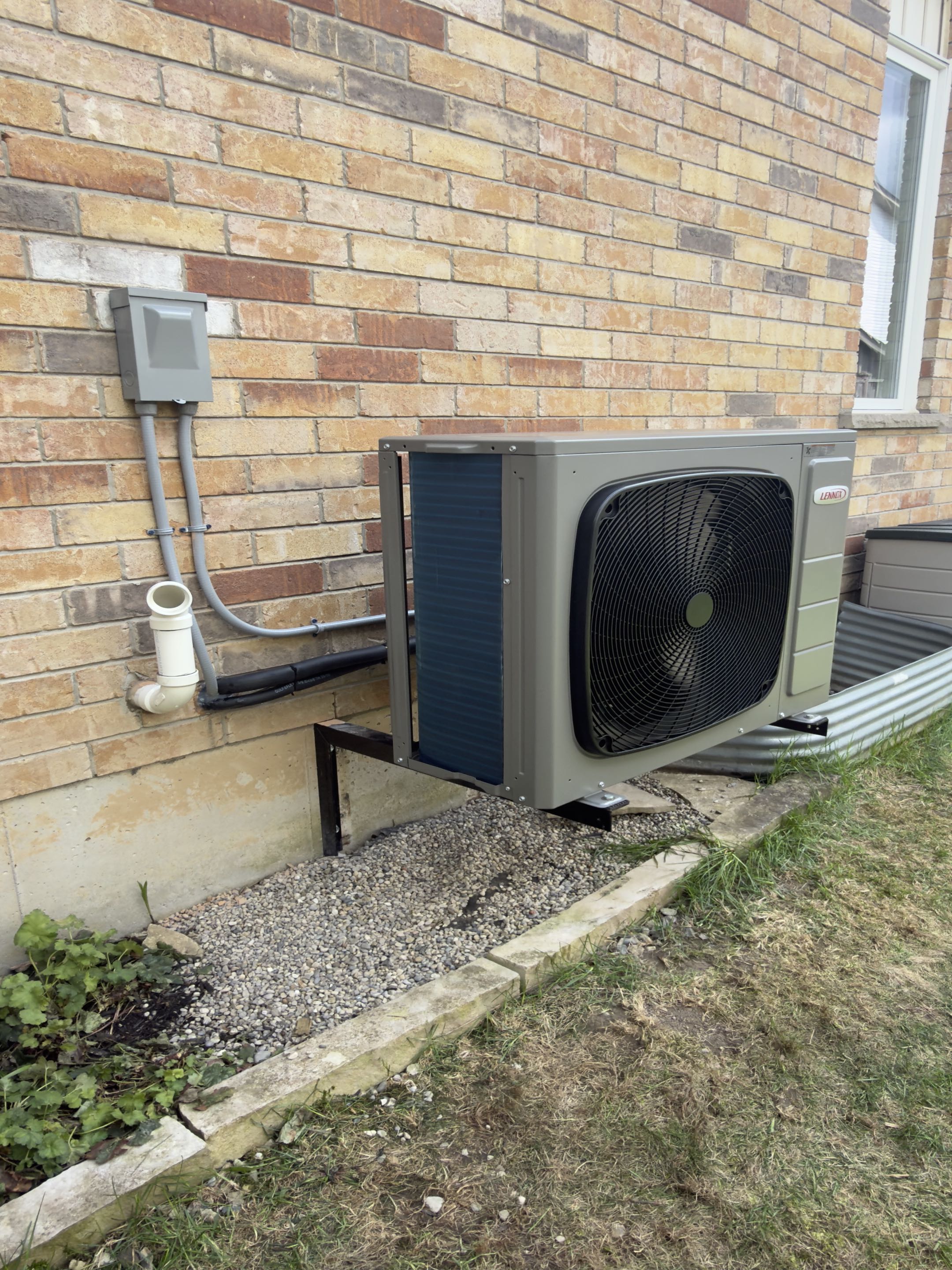 Completing a Lennox Heat pump installation for a family in Baden