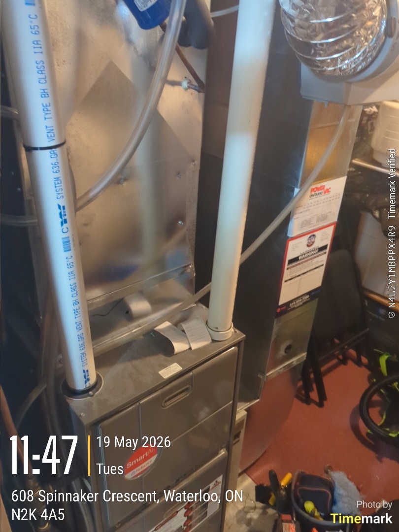 Completing a furnace and AC tune up for a family in the Northfield area of Waterloo