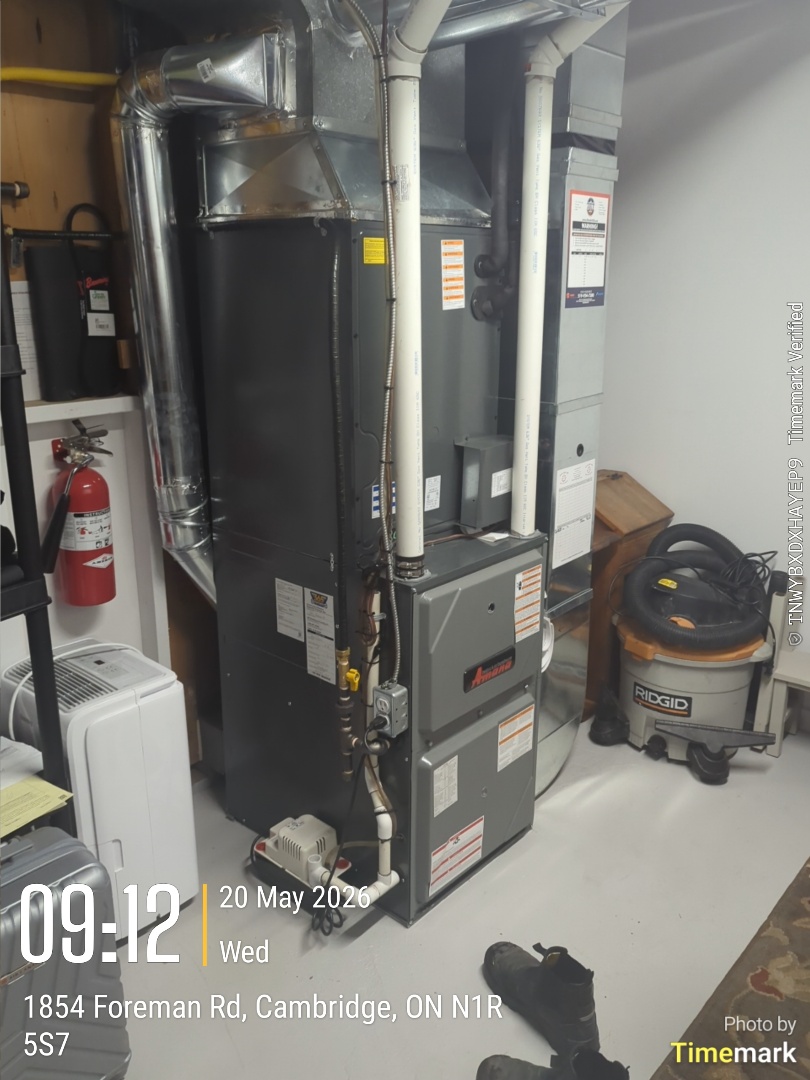 Completing an Amana furnace and heat pump tune up for a family in Valens area of Cambridge 