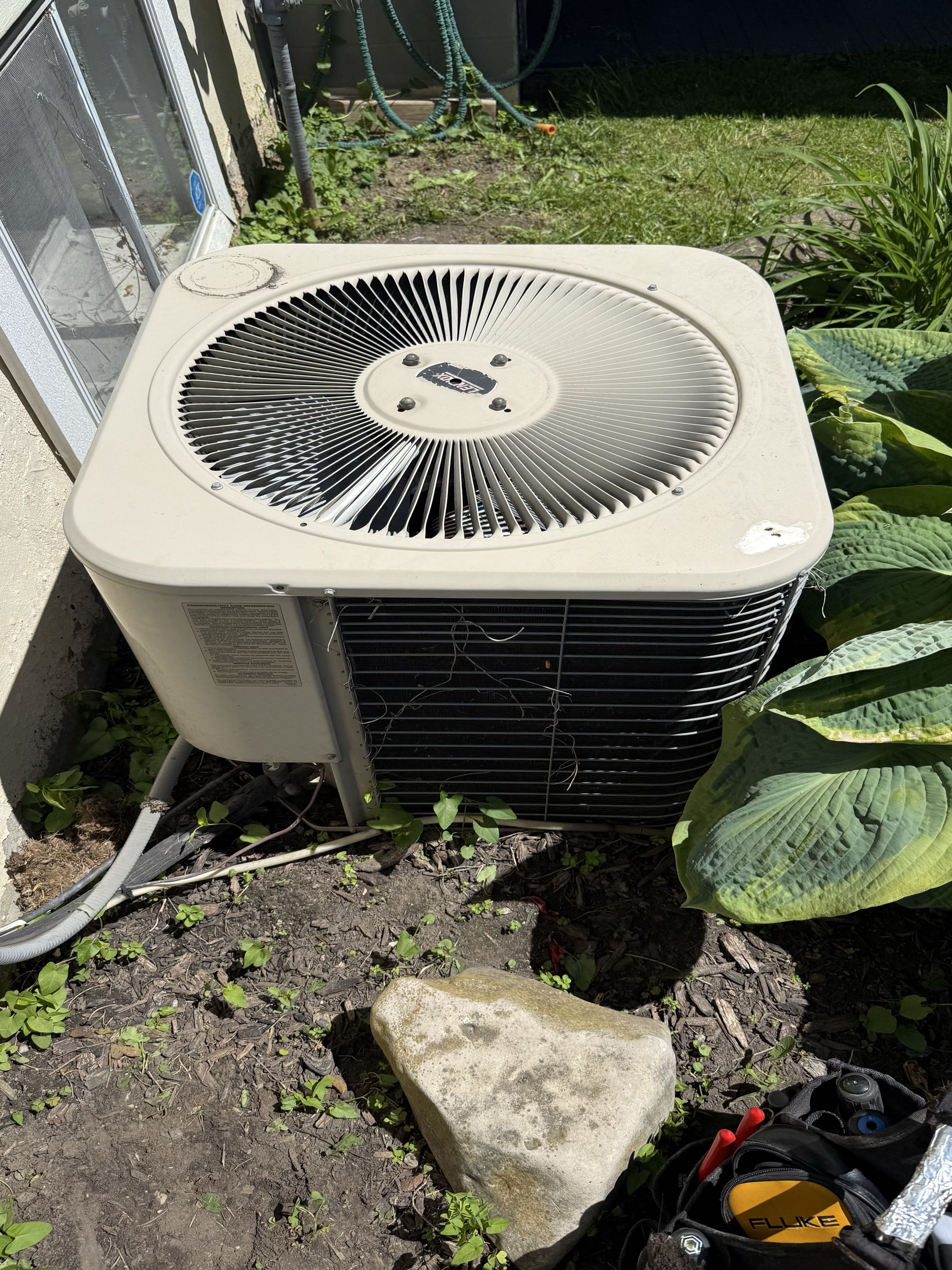 Completing an Ac repair for a family in the Huron Park area of Kitchener 