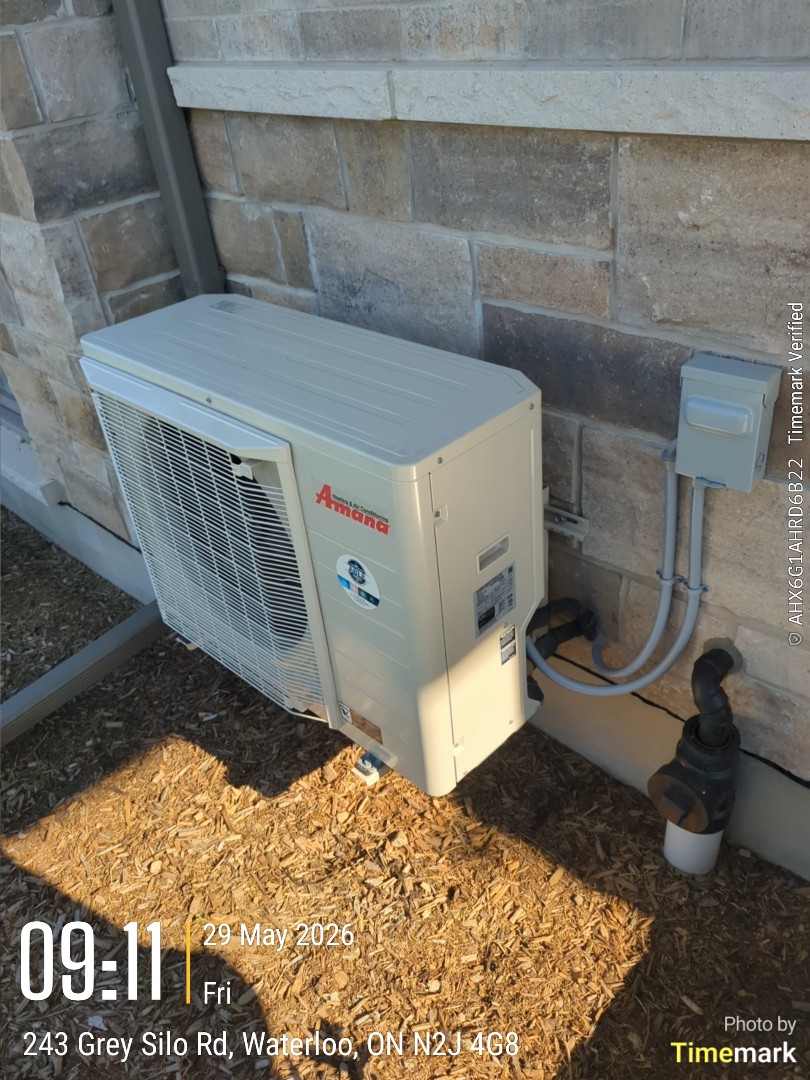 Completing an Amana heat pump tune up for a customer in Waterloo
